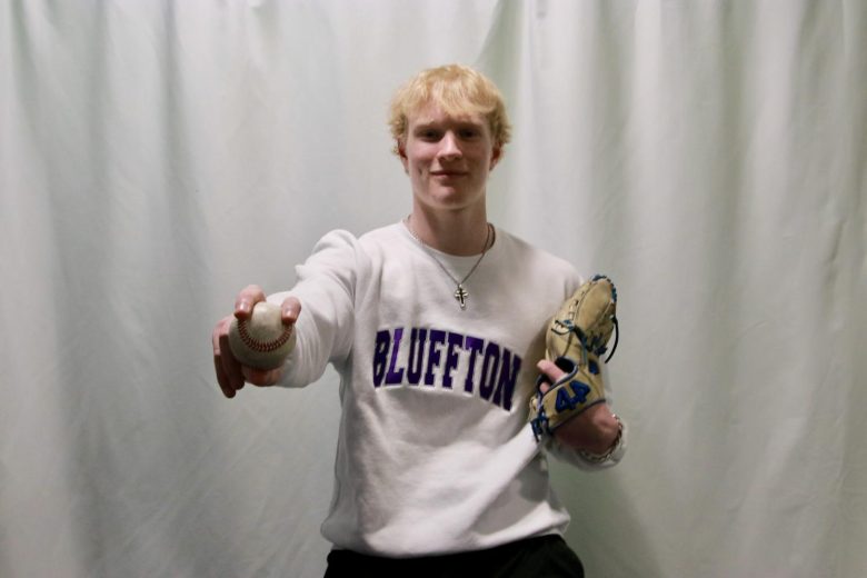 Matthew Becher with baseball mitt and glove