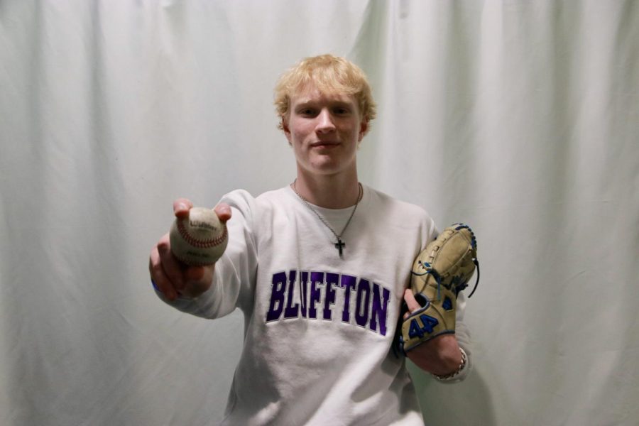 Matthew Becher with baseball mitt and ball