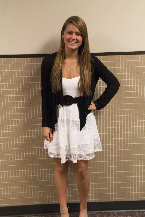 Both male and female students are frequently sent to their dean because of dress code violations, especially at the beginning and end of the school year. Rules of thumb include that midriffs should be covered, straps should be wider than three fingers and hems should be longer than where the student’s fingertips reach. (Jackie Smith, a 2015 graduate, models a school-appropriate outfit in this photo.) Boys may not wear t-shirts with the sleeves cut off and arm openings reaching down to their waists. School administration stresses that, although there are guidelines, the dean has the final say in whether or not a student is dressed inappropriately. “You want to leave no question that someone would look at you and your countenance, and not be offended,” dean Jagga Rent said. “Don’t worry about the technicalities of if it’s long enough, but instead whether or not people would be offended by your dress, whether it’s a message on your shirt or the length. I tell kids, if you have a question about what you’re going to wear, don’t wear it. Or you can take a picture of yourself wearing the outfit at home and bring it in to show us, and we’ll say yes or no.”