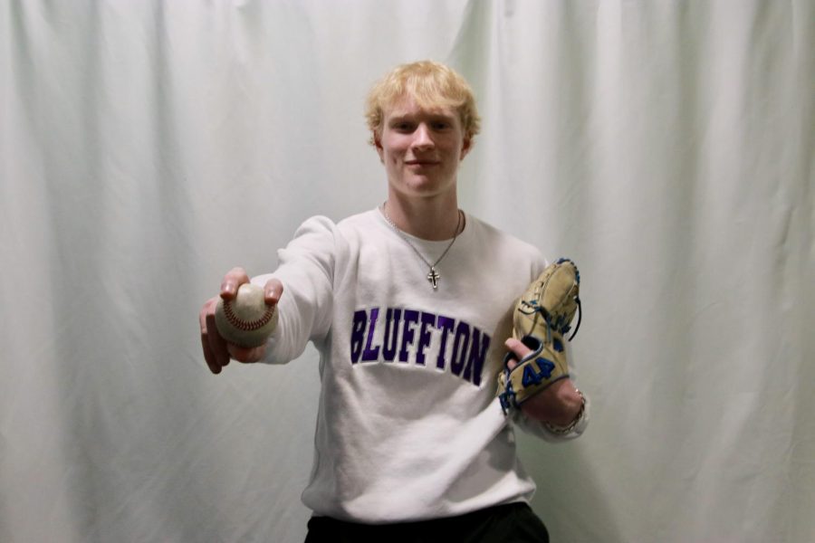 Matthew Becher with baseball mitt and glove