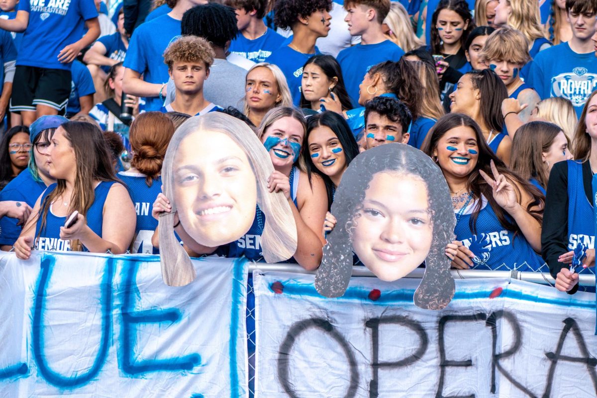 Royals fans supporting the HSE football managers.